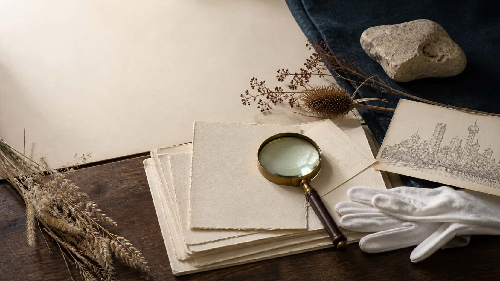 Archival research desk with engraved maps, cotton gloves, brass tools, and a blank protected note sleeve