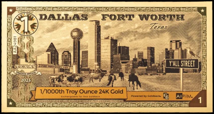 Front of the 2025 Dallas–Fort Worth 1 Goldback, showing the Dallas skyline, longhorn cattle, drovers, and a Y’all Street sign
